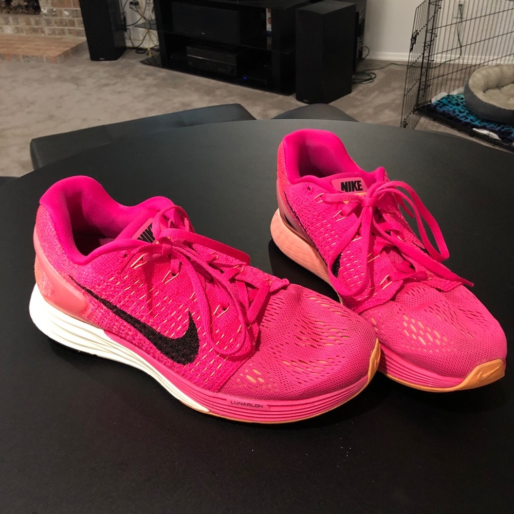 Pink nike running shoes